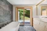 Experience luxury and tranquility in this stunning bathroom.