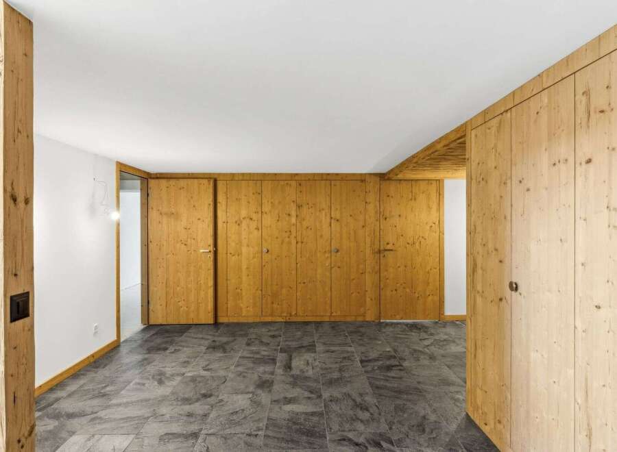 Discover the charm of this stunning property featuring exquisite wooden paneling and a modern design.