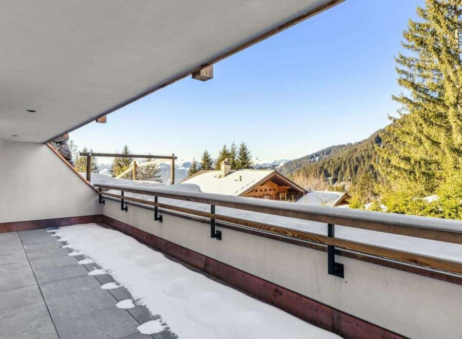Enjoy breathtaking mountain views from this stunning balcony.