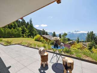 Experience breathtaking mountain views from this stunning property.