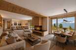 Experience luxury mountain living in this stunning open-concept living and dining area.