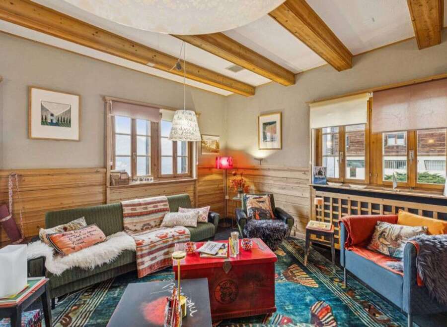 Step into a cozy living space with rustic charm.