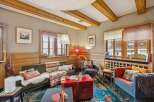 Step into a cozy living space with rustic charm.