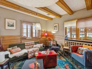 Step into a cozy living space with rustic charm.