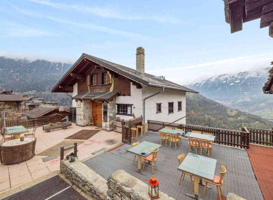 Discover a charming mountain retreat with this stunning property.