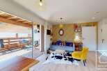 Discover this charming property featuring a cozy living area with stylish decor and a comfortable sofa.