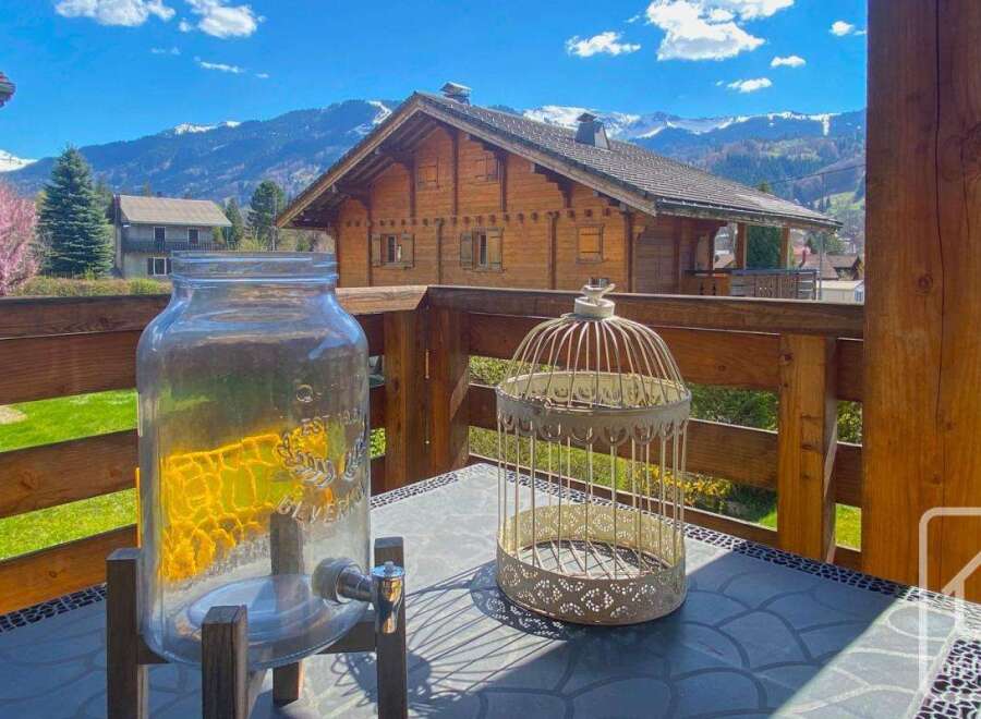 Enjoy breathtaking mountain views from this charming property.