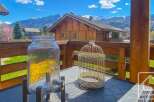 Enjoy breathtaking mountain views from this charming property.