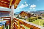Enjoy breathtaking mountain views from this charming property.