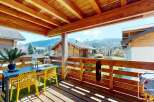 Enjoy breathtaking mountain views from this charming property.