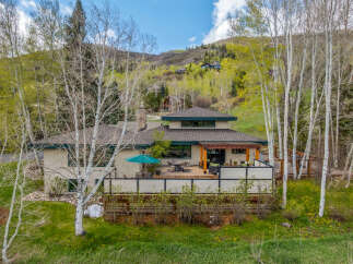 Nestled in a serene natural setting, this stunning property offers a perfect blend of luxury and tranquility.