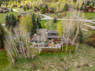 Discover your dream home nestled in a serene mountain setting.