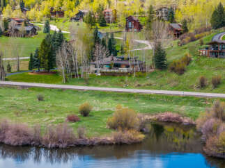 Nestled in a picturesque mountain setting, this stunning property offers unparalleled views and a serene atmosphere.