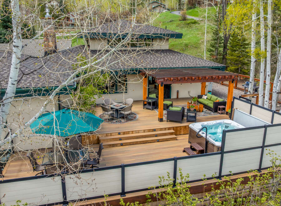 Experience luxury living in this stunning property featuring a spacious deck, perfect for entertaining or relaxing.