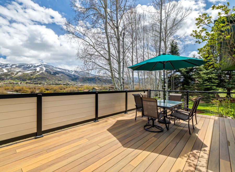 Enjoy breathtaking mountain views from this stunning outdoor deck.