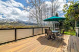 Enjoy breathtaking mountain views from this stunning outdoor deck.
