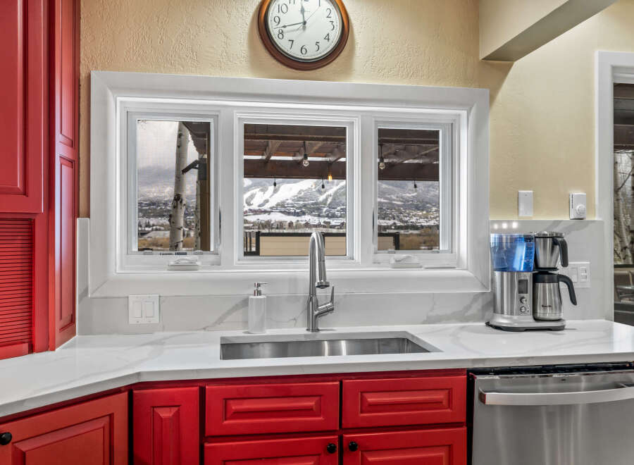 This stunning kitchen boasts a bright and airy feel, perfect for culinary adventures.