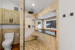 Step into luxury with this stunning bathroom featuring a spacious walk-in shower.