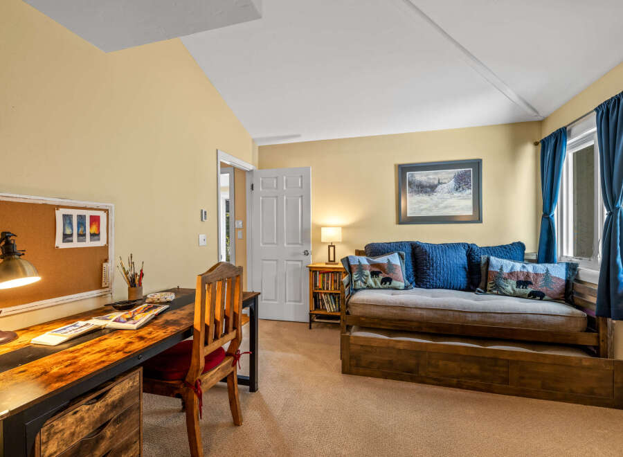 This cozy room features a comfortable daybed, perfect for relaxing or accommodating guests.