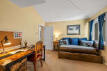This cozy room features a comfortable daybed, perfect for relaxing or accommodating guests.