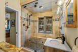 Step into luxury with this stunning bathroom! Featuring a spacious glass shower, a stylish vanity, and a beautiful stone tile design, this bathroom is the perfect blend of elegance and functionality.
