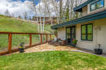 Enjoy the tranquility of this stunning property featuring a beautifully landscaped yard and a charming patio area.