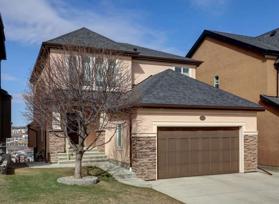 This stunning property boasts a beautiful exterior with a modern design and a well-maintained yard.