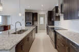 This stunning kitchen boasts modern design and high-end finishes.