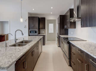 This stunning kitchen boasts modern design and high-end finishes.