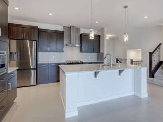 This stunning kitchen boasts modern design and high-end finishes.