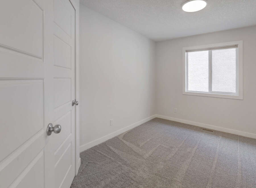 Step into this bright and airy bedroom, featuring a neutral color palette that offers a versatile canvas for any decor style.