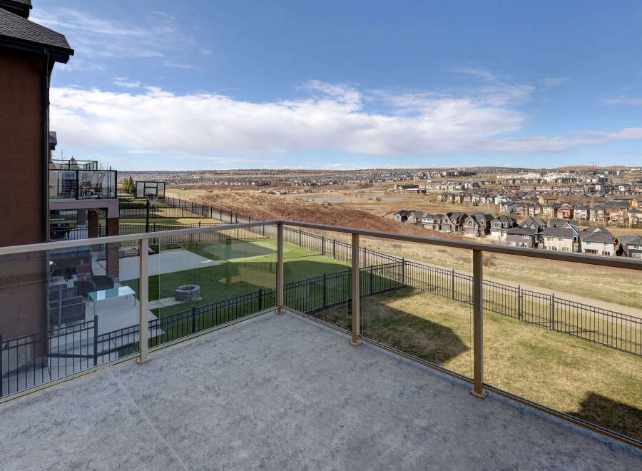 Enjoy breathtaking views from this stunning property! This home features a spacious balcony, perfect for relaxing and taking in the scenery.