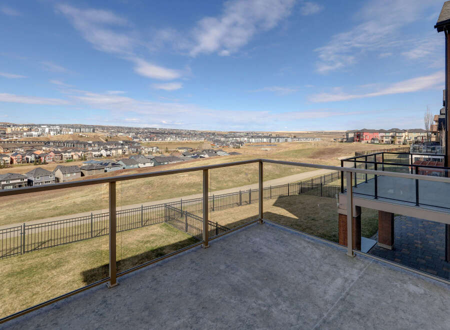 Enjoy breathtaking views from this stunning property! This home features a spacious balcony, perfect for relaxing and taking in the scenery.