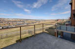 Enjoy breathtaking views from this stunning property! This home features a spacious balcony, perfect for relaxing and taking in the scenery.