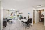 Discover modern living in this stylish apartment! Featuring a bright and open floor plan, this property boasts a sleek dining area and a comfortable living space.