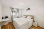 Discover this inviting bedroom featuring a comfortable bed, perfect for relaxation.