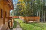 Discover the charm of this stunning wooden property nestled in a serene, wooded setting.