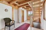 Step into this inviting home with its warm wooden accents and a touch of rustic charm.