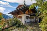 Discover the charm of this stunning chalet nestled in a picturesque mountain setting.