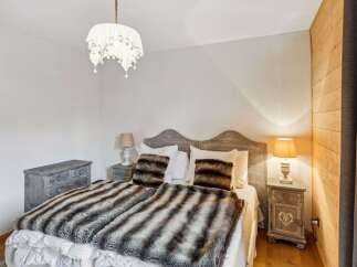 Experience the epitome of comfort and style in this beautifully designed bedroom.