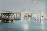 Discover the convenience of this well-lit parking garage, perfect for secure vehicle storage.