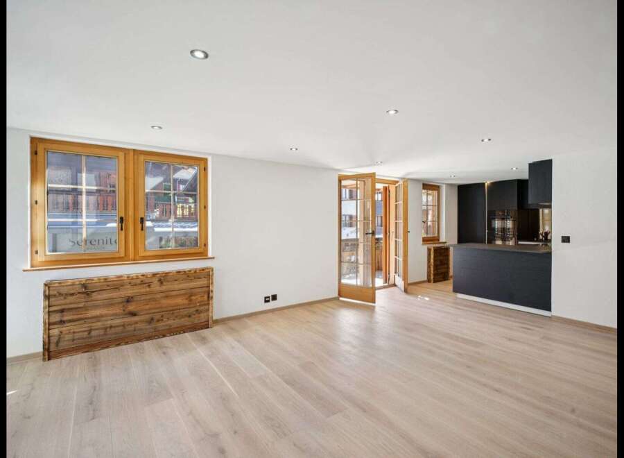 Discover the charm of this stunning property, featuring a bright and airy interior with beautiful wooden accents.