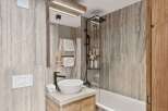 Step into a spa-like oasis with this stunning bathroom design.