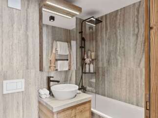Step into a spa-like oasis with this stunning bathroom design.