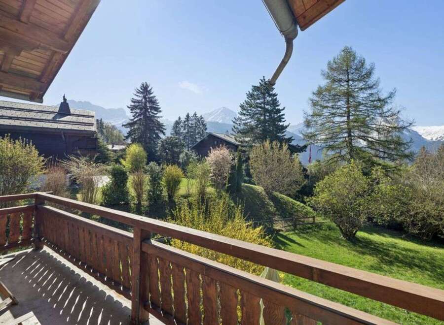 Enjoy breathtaking mountain views from this charming property.