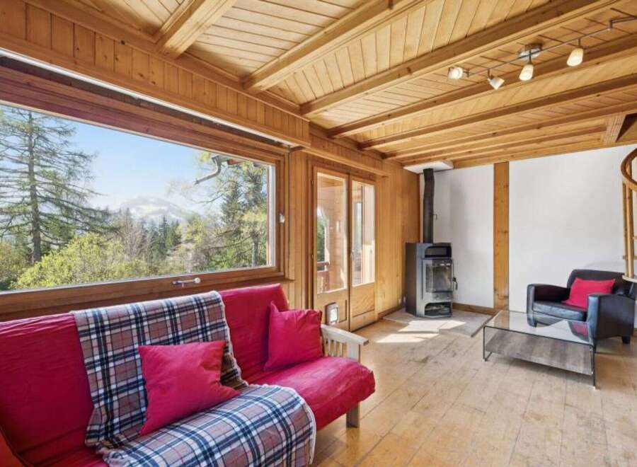 Experience the charm of this cozy cabin with stunning mountain views.