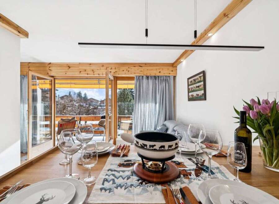 Experience the charm of this inviting dining area, perfect for intimate gatherings.