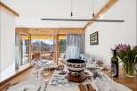 Experience the charm of this inviting dining area, perfect for intimate gatherings.