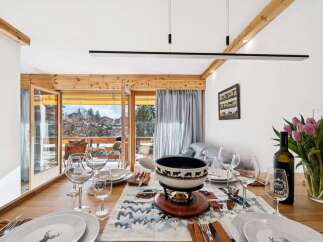 Experience the charm of this inviting dining area, perfect for intimate gatherings.