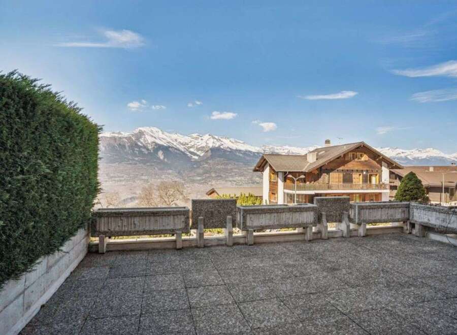 Enjoy breathtaking mountain views from this stunning property.